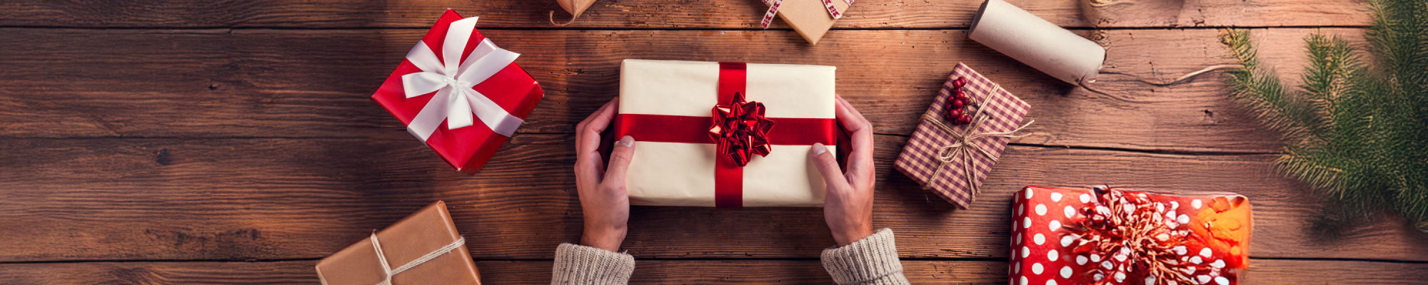 Overhead view of gifts being wrapped